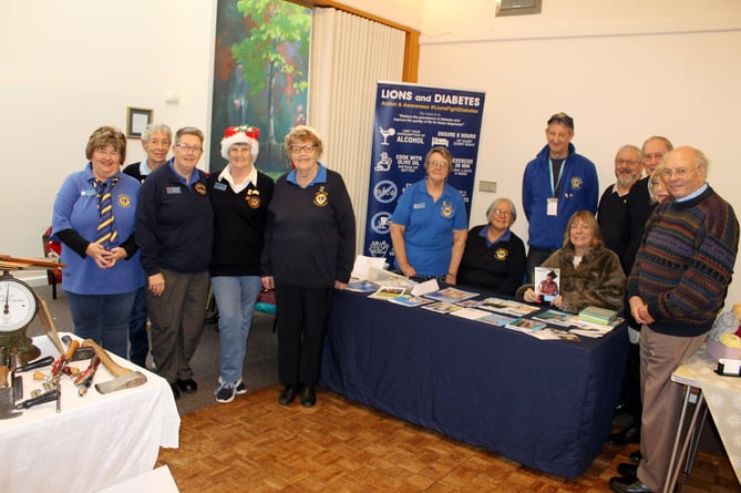 Crediton and District Lions with their Diabetes Awareness stand at the Christmas Craft Table Top Sale held at the Boniface Centre.  AQ 0025
