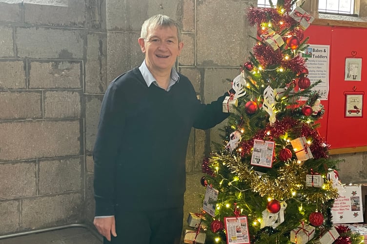 The Crediton Courier tree with the Courier Editorial Manager Alan Quick.  AQ 1445