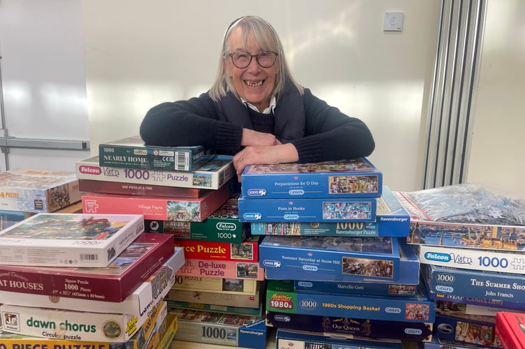 The jigsaw puzzle stall had sold several by the time this photo was taken!  AQ 0732