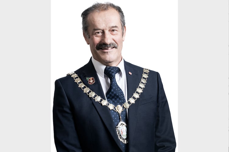 Cllr Percy Prowse, the chairman of Devon County Council.

