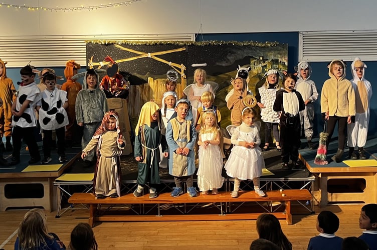 Cheriton Fitzpaine Primary School pre-school, EYFS and KS1 on stage for ‘Born in a Barn’.
