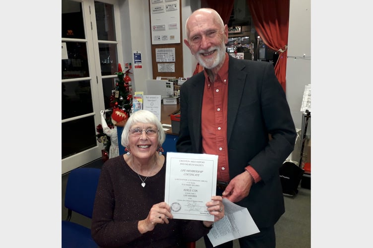 Adele Cox receiving her Life Membership certificate from Crediton Area History and Museum Society Chair Tony Gale.