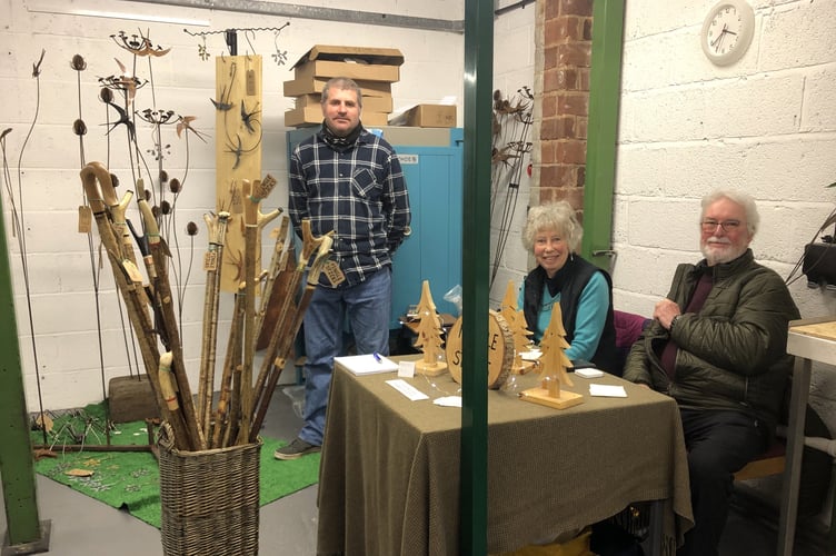Pictured are Chris Marshall of Fingle Sticks, left, with Aaron from Cuffy and Sons, blacksmith.