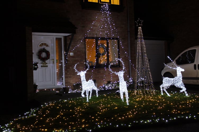 In second place was the home of Denise Stoneman, who received a box of chocolates. SR 9381