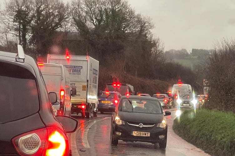 The traffic queue due to the landslip near Crediton.  AQ 3139