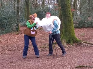 Charity coast path walkers dressed as a poo emoji and a loo roll