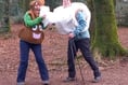 Charity coast path walkers dressed as a poo emoji and a loo roll