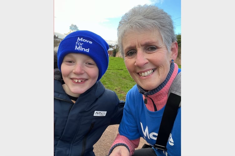 Debbie Keast with her grandson, Oscar (8), who has been supporting her along the way.