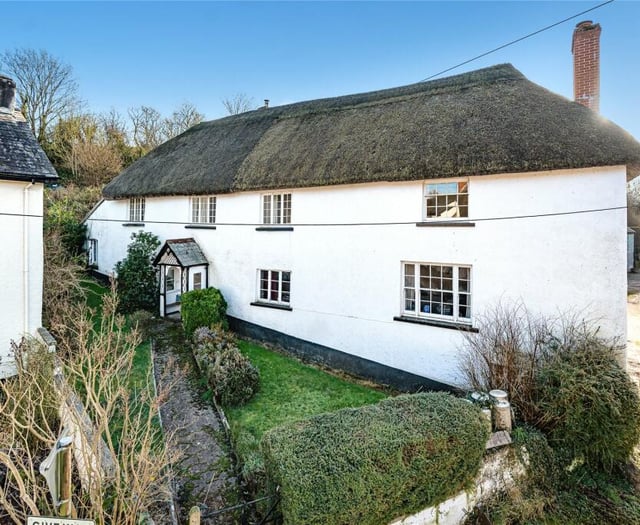 Former farmhouse for sale has 1500s origins and "charming" features 