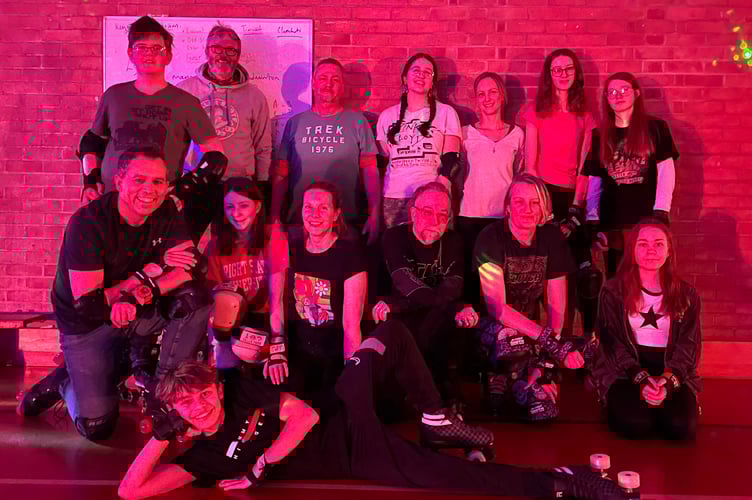 Roller Rebels skaters during a recent Roller Disco session with Simon Archer, front left. AQ 3563