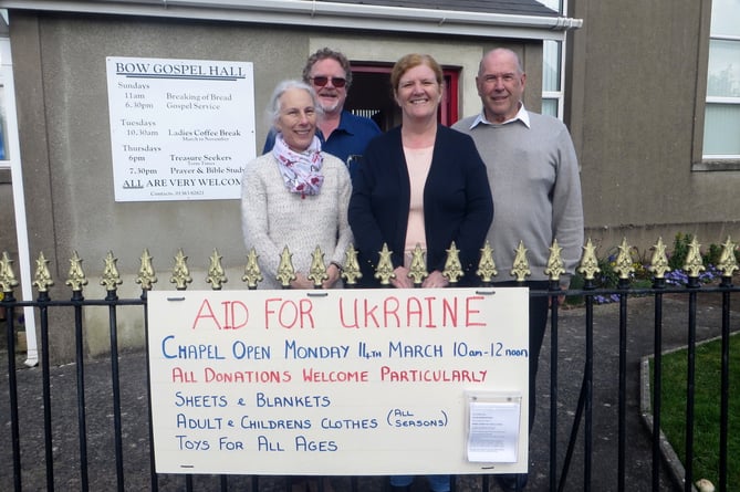 Outside Bow Gospel Hall with the sign two years ago are Ian and Jayne Finch and Ken and Wendy Harris. SR 1324
                   