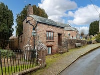 "Unique" cottage for sale has 1800s origins - and a hidden trap door 