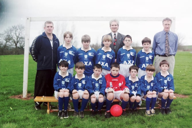 Copplestone School football team received a new strip, sponsored by AXA, in February 1999. DSC00688
