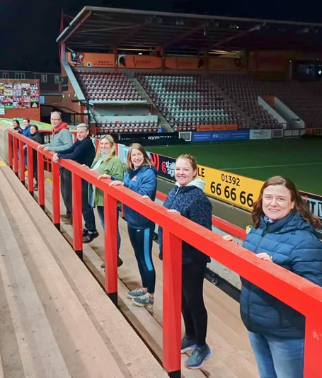 The group taking part in an activity session on the Big Bank at St James Park.