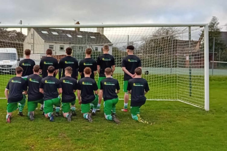 DTR Garden Services name is on the back of the Sandford AFC training tops.
