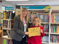 Gold for Julia (8), who has read 250 books from Crediton Library

