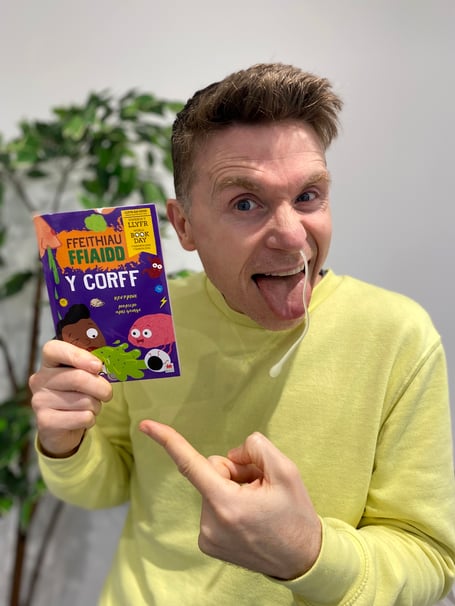 Kev Payne, author and illustrator, with his book which was chosen as a £1 World Book Day book.