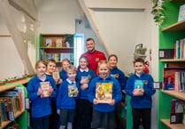 Exeter City FC Captain opens newly renovated school library
