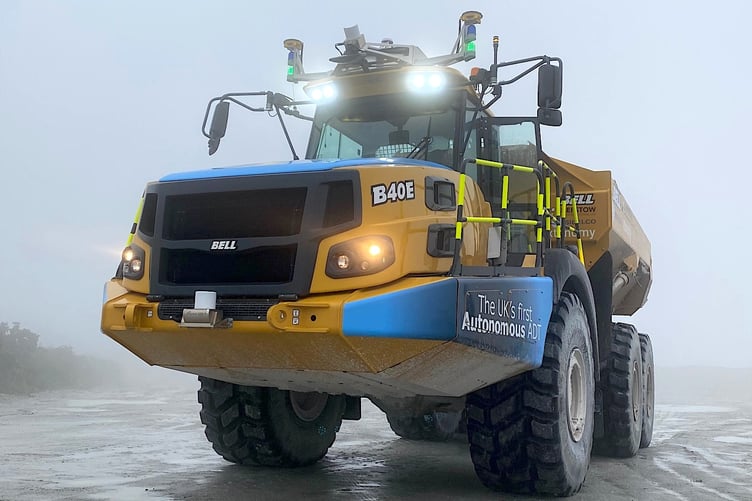 The huge dumpster truck (ADT) does not need a driver to operate it