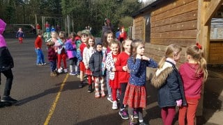 Having fun and wearing red for Red Nose Day at Yeoford Primary School.
