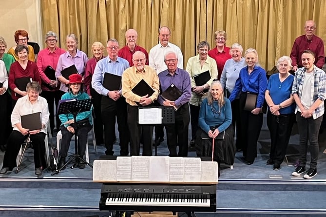 The Mid Devon Good Afternoon Choir and director Jon Rawles, front right.