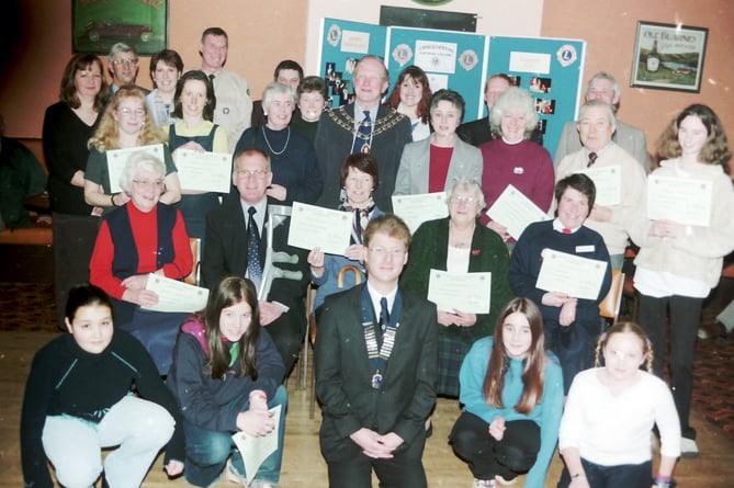 Representatives from local organisations received cheques from Crediton Carnival funds in February 2001.  DSC00009

