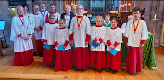 Some of the Crediton Choir members with Joshua, right.
