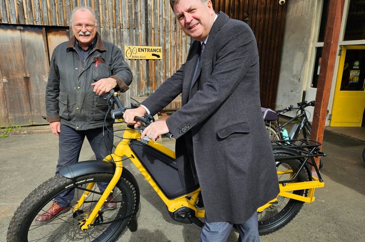 Mel Stride, MP for Central Devon, with the Bike Shed owner, Mike Sanders.