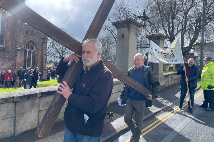Carrying the cross from Crediton Parish Church. AQ 9024