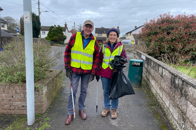 Mr and Mrs Warren returning from some litter picking.  AQ 7944
