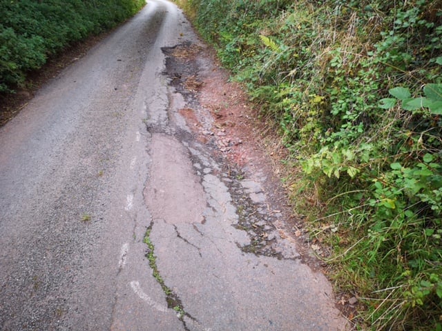 Nancy Murgatroyd says that the pothole system is not working in Devon. Pictured is a recent pothole from West Sandford to Crediton Road. Contributed