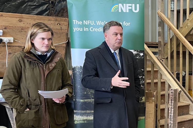 Fiona Rew, NFU Devon County Adviser and Mel Stride addressing the NFU meeting in Crediton.