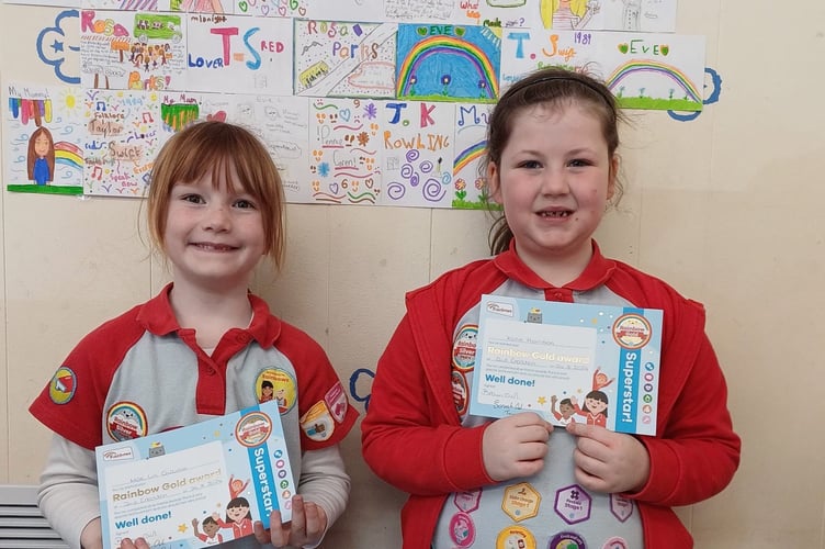 Katie and Mae Lin from the 2nd Crediton Rainbows who have completed their Gold Awards.