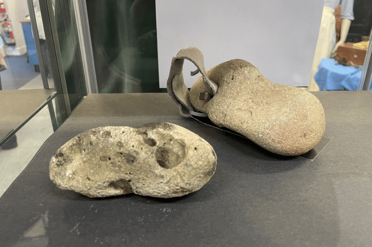 The mystery of holes in stones is explained in the exhibition. AQ 9414