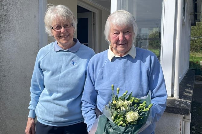 Doris Jewell, right, with her flowers on her 93rd birthday, with Lin Atkinson, left.

