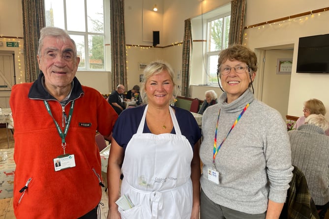 Local councillors Frank and Natalia Letch, left and right, congratulated Kate Fitch on a successful event in aid of FORCE.  AQ 8025
