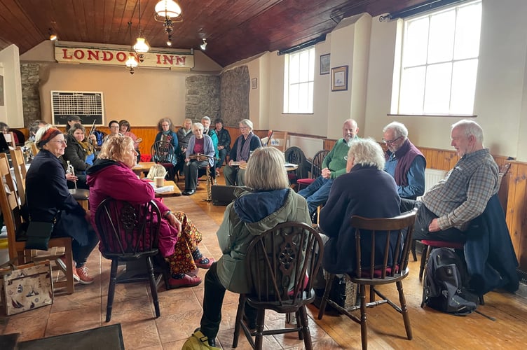 During a music and song session at The London Inn.  AQ 8692