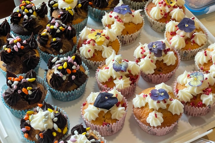 Some of the impressive cakes for sale on the cake stall.  AQ 0102
