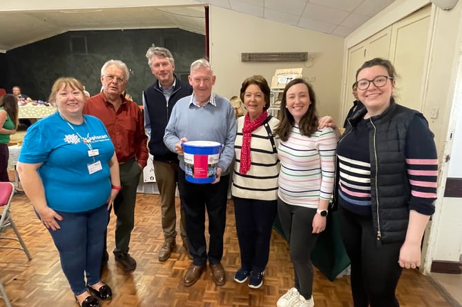 From left at the Craft Fair and Coffee Morning, Sharon Collins from Hospiscare, Hospiscare Ambassadors Adrian Miller and Andy Gray, and members of the Lee family, with Victoria, second right.  AQ 0116
