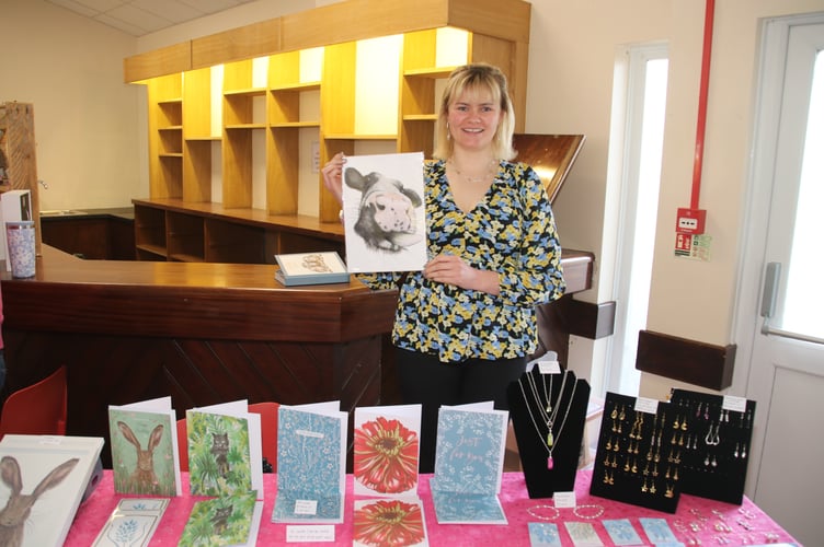 Chantelle Rae from Winkleigh, a member of Cheriton and Tedburn YFC, sold art prints and cards she had made as well as some of her hand-made jewellery. AQ 0016