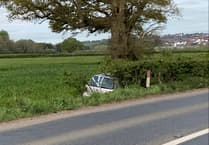 Woman trapped after car leaves road near Crediton