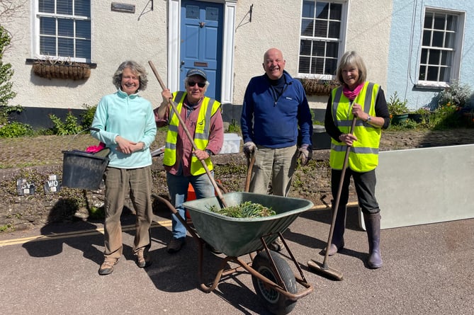 More than a dozen took part in the Spring Clean at Sandford on April 20 and pictured are some of those who took part.  AQ 0417
