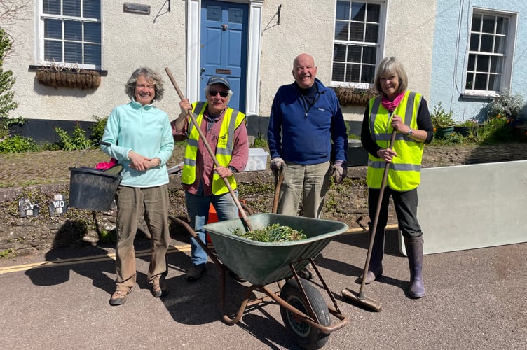 More than a dozen took part in the Spring Clean at Sandford on April 20 and pictured are some of those who took part. AQ 0417