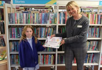Local girl reads 50 books in single year in library challenge
