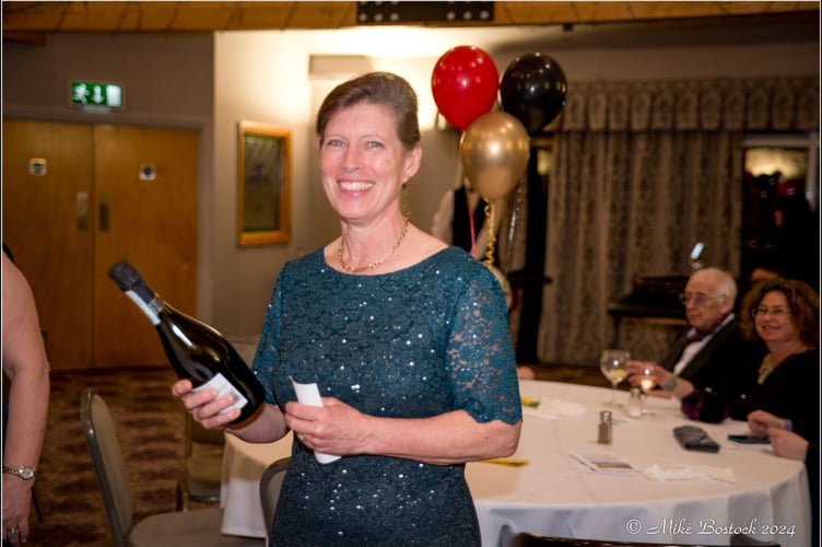 One of the raffle prizewinners at the Casino Night. Image: Mike Bostock