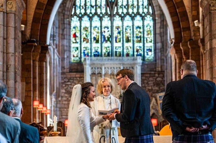 A solemn moment during the ceremony.  Image Hannah Frost
