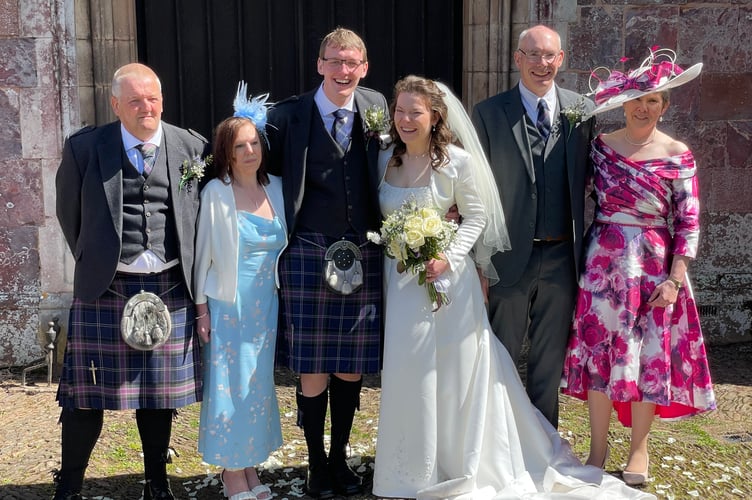Lewis and Catherine with some of their family members.  AQ 0472
