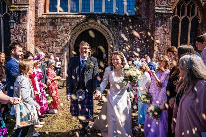 Walking through a cloud of confetti after leaving the church.  Image: Hannah Frost
