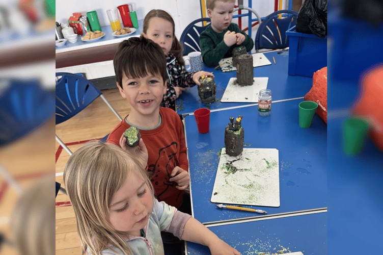 Making clay fairy houses for trail to Story Mountain