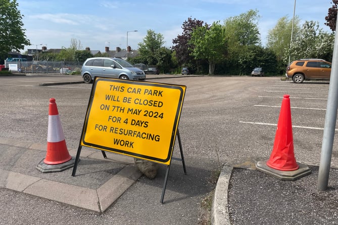 One of the warning signs at the entrance to the Crediton Railway Station Park and Ride car park.  AQ 1873
